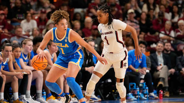 South Carolina Gamecocks guard Zia Cooke defends UCLA Bruins guard Kiki Rice.